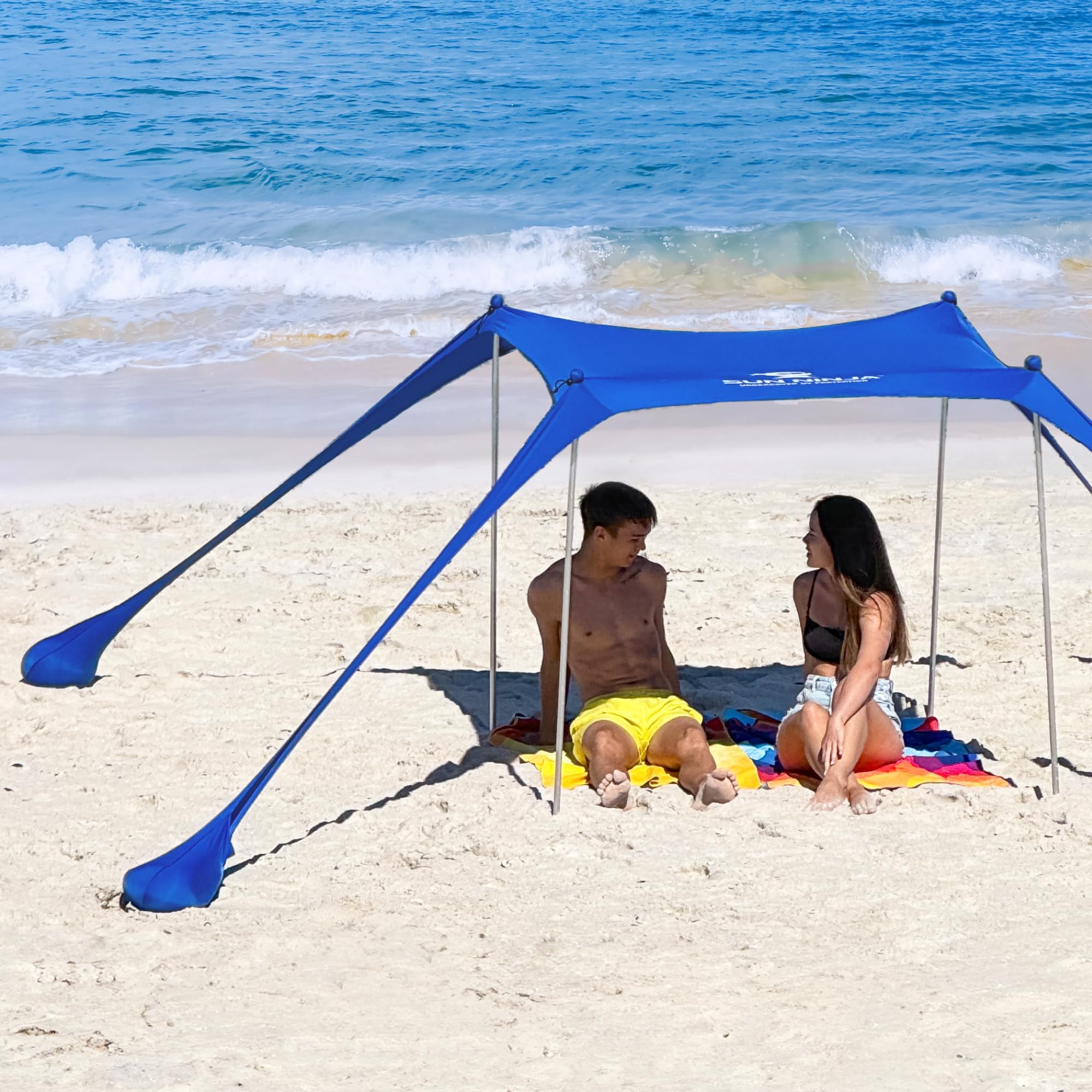 SUN NINJA Beach Tent Sun Shelter UPF50+ - Easy Pop Up Beach Canopy - Outdoor Shade for Camping Trips, Fishing, Backyard Fun Picnics - Sand Shovel, Ground Pegs & Stability Poles