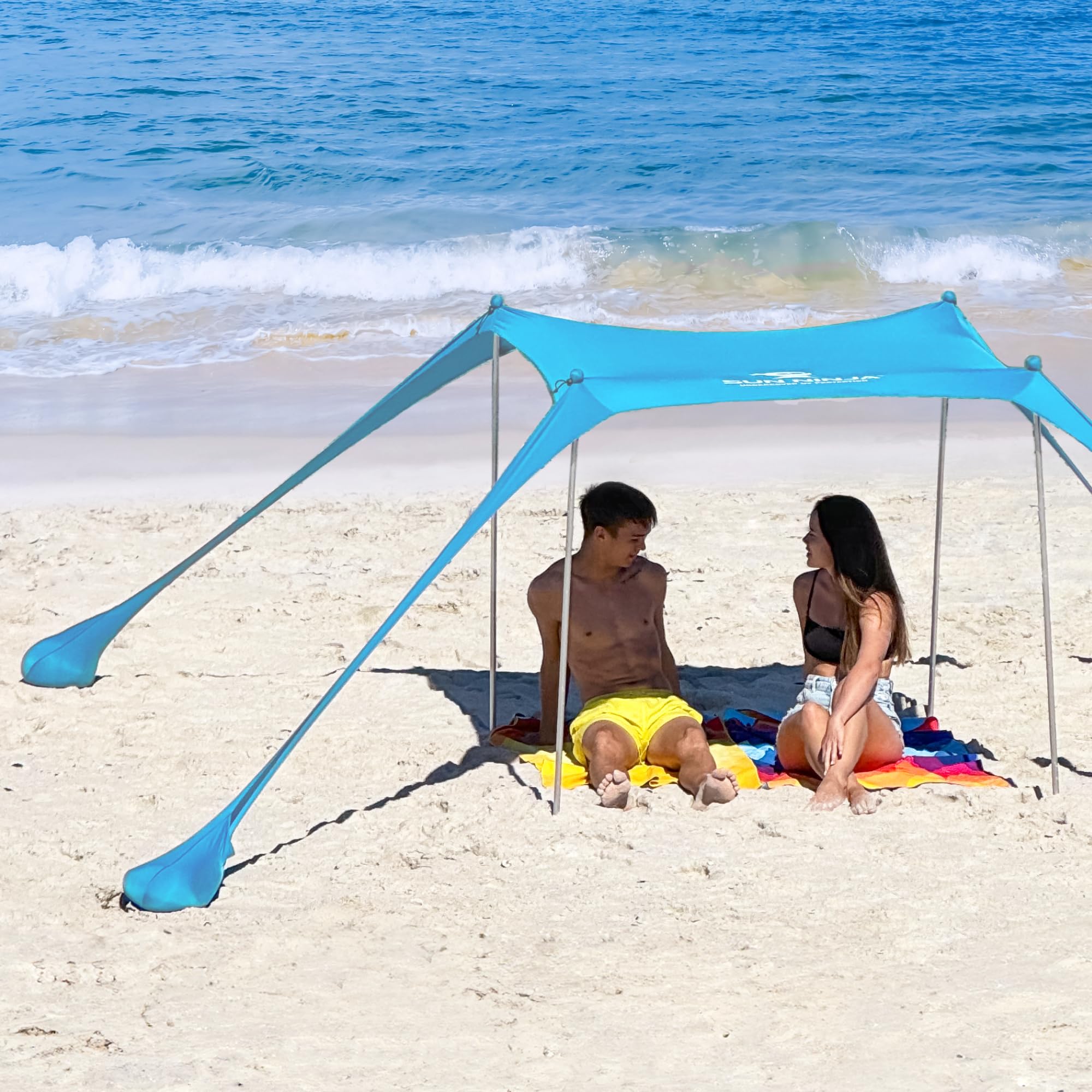 SUN NINJA Beach Tent Sun Shelter UPF50+ - Easy Pop Up Beach Canopy - Outdoor Shade for Camping Trips, Fishing, Backyard Fun Picnics - Sand Shovel, Ground Pegs & Stability Poles
