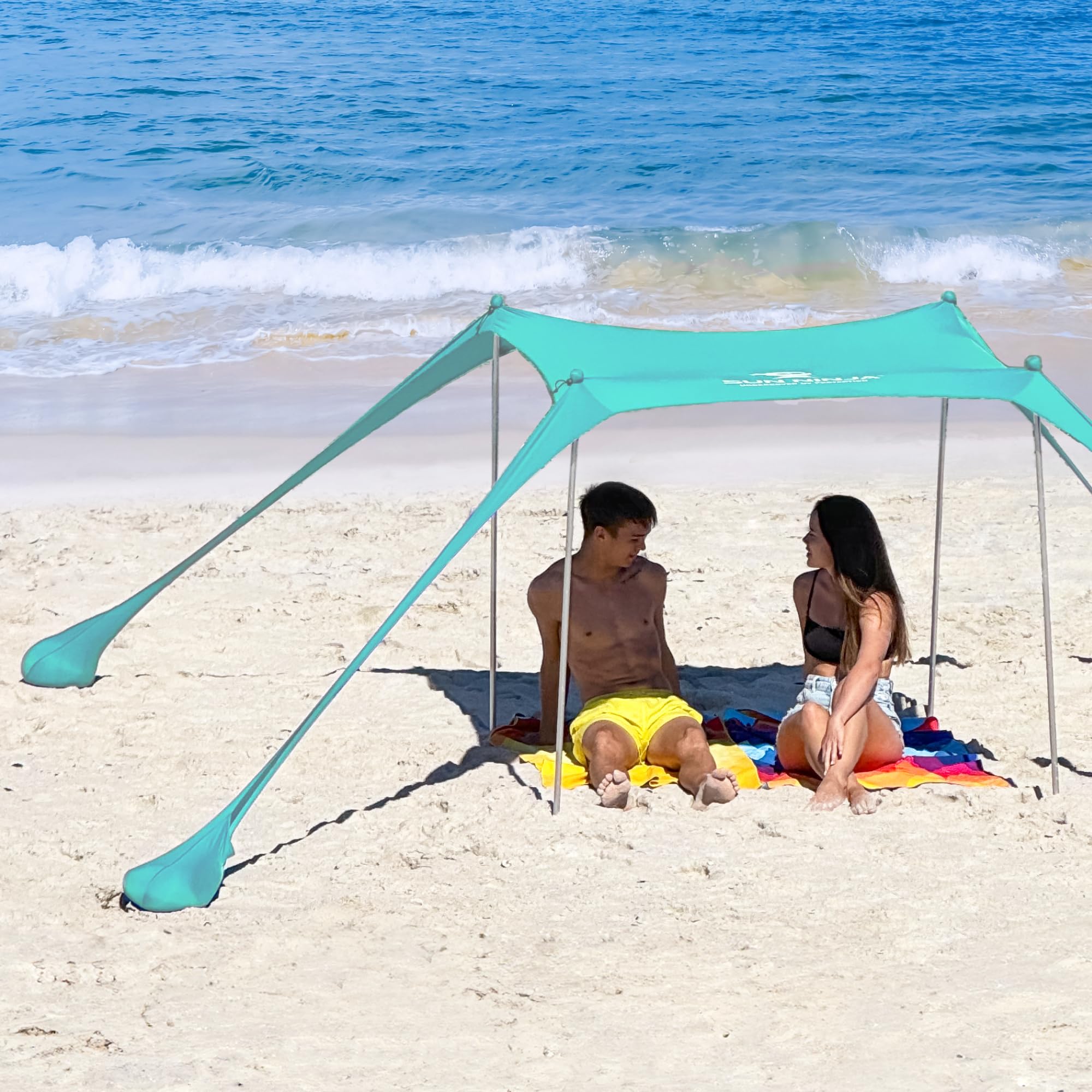 SUN NINJA Beach Tent Sun Shelter UPF50+ - Easy Pop Up Beach Canopy - Outdoor Shade for Camping Trips, Fishing, Backyard Fun Picnics - Sand Shovel, Ground Pegs & Stability Poles